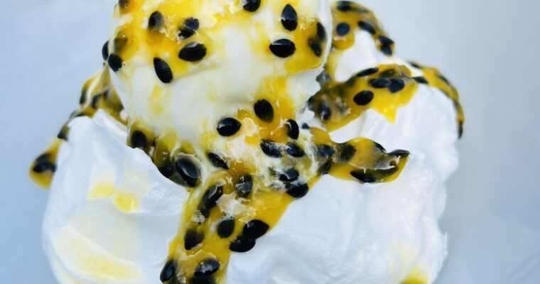 Meringue with coconut ice cream, passion fruit sereh coulis and kaffir lime