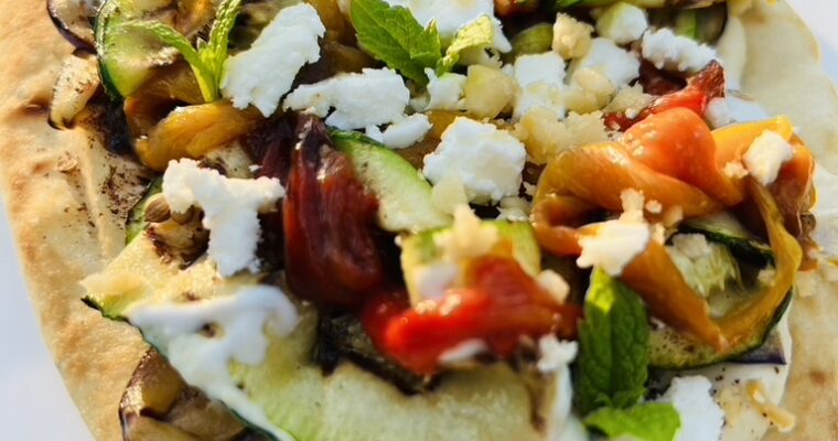 Naan with grilled greens, feta & hummus