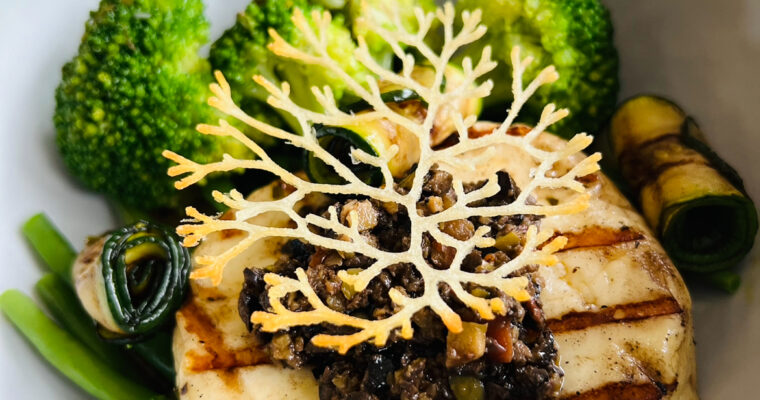 Grilled haloumi steak with greens, beurre noisette & tapenade